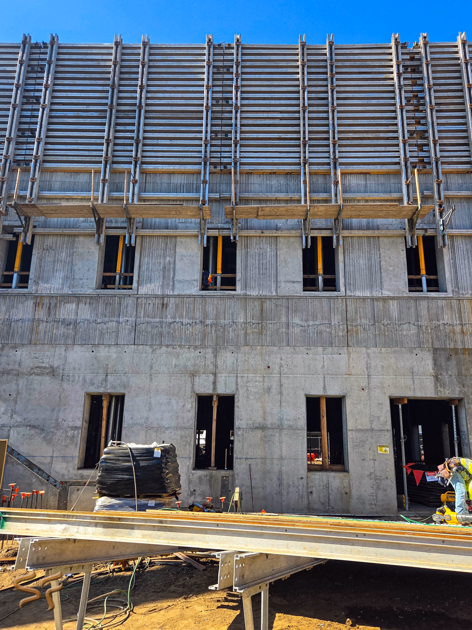 LACC Cesar Chavez Administration and Workforce Building exterior with Custom Wave Flute formliner, Los Angeles CA